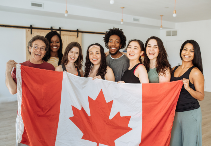 Group celebrating with Canadian flag